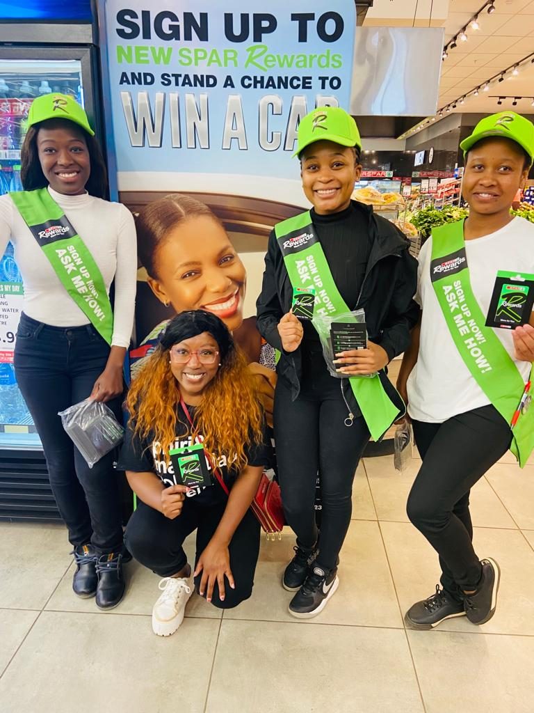 Brand ambassadors running a SPAR Rewards sign-up promotion in-store