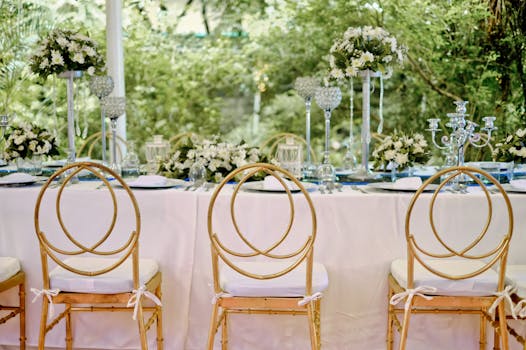 Beautiful outdoor table setting with floral decor, perfect for weddings or events.